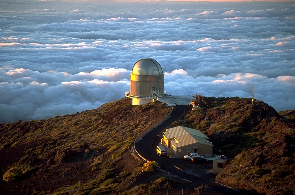 Nordic Optical Telescope above a sea of clouds at Roque de los Muchachos Observatory
